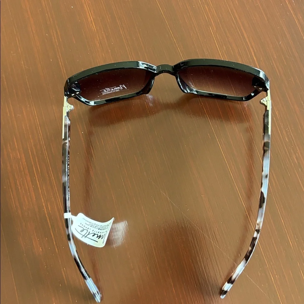Nanette Lepore 100% UV protect,black frame,tortoise arms,black lens sunglasses